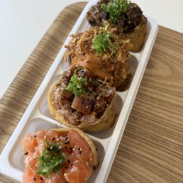Fresh salmon, ginger tuna, chipotle salmon and bulgogi Fresh salmon, ginger tuna, chipotle salmon and bulgogi