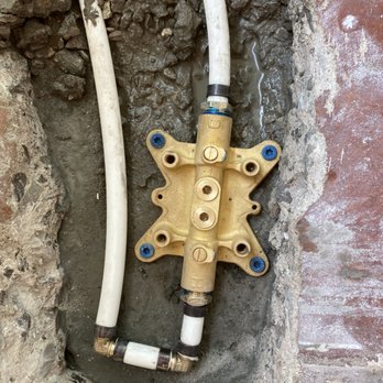 A2Z Construction - a couple of pipes in a hole - Plumbing Near Me A2Z Construction - a couple of pipes in a hole - Plumbing Near Me