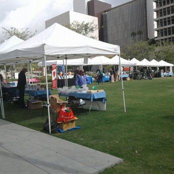 B & W - a group of people sitting under tents - Food Trucks Near Me - Encino, California B & W - a group of people sitting under tents - Food Trucks Near Me - Encino, California