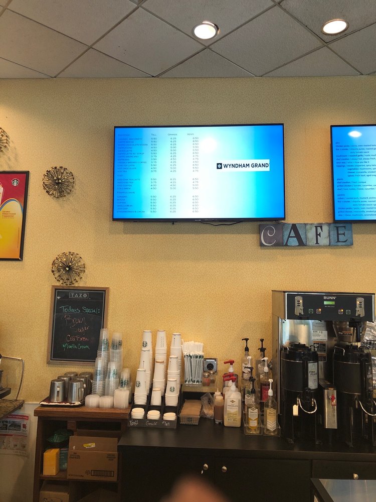 Caffeina's Cafe & Dessert Bar Logo