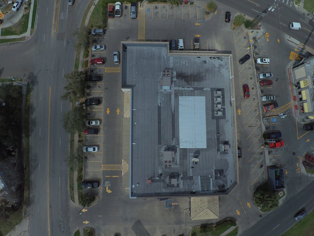 Slide of DLJ Commercial Roofing