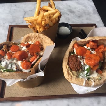 Brassica - Brisket and falafel sandwich with fries - Mediterranean Near Me - Columbus, Ohio Brassica - Brisket and falafel sandwich with fries - Mediterranean Near Me - Columbus, Ohio