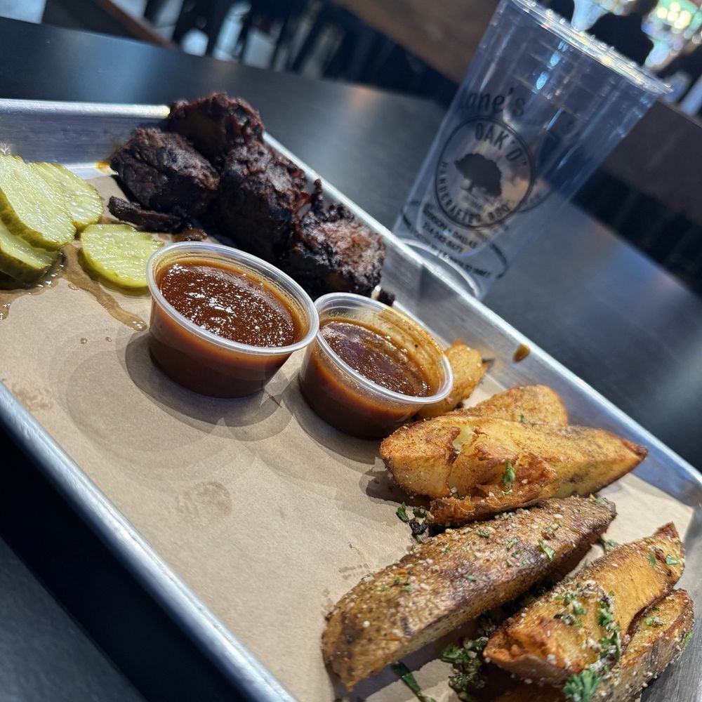 Burnt end briskets and steak, fries.