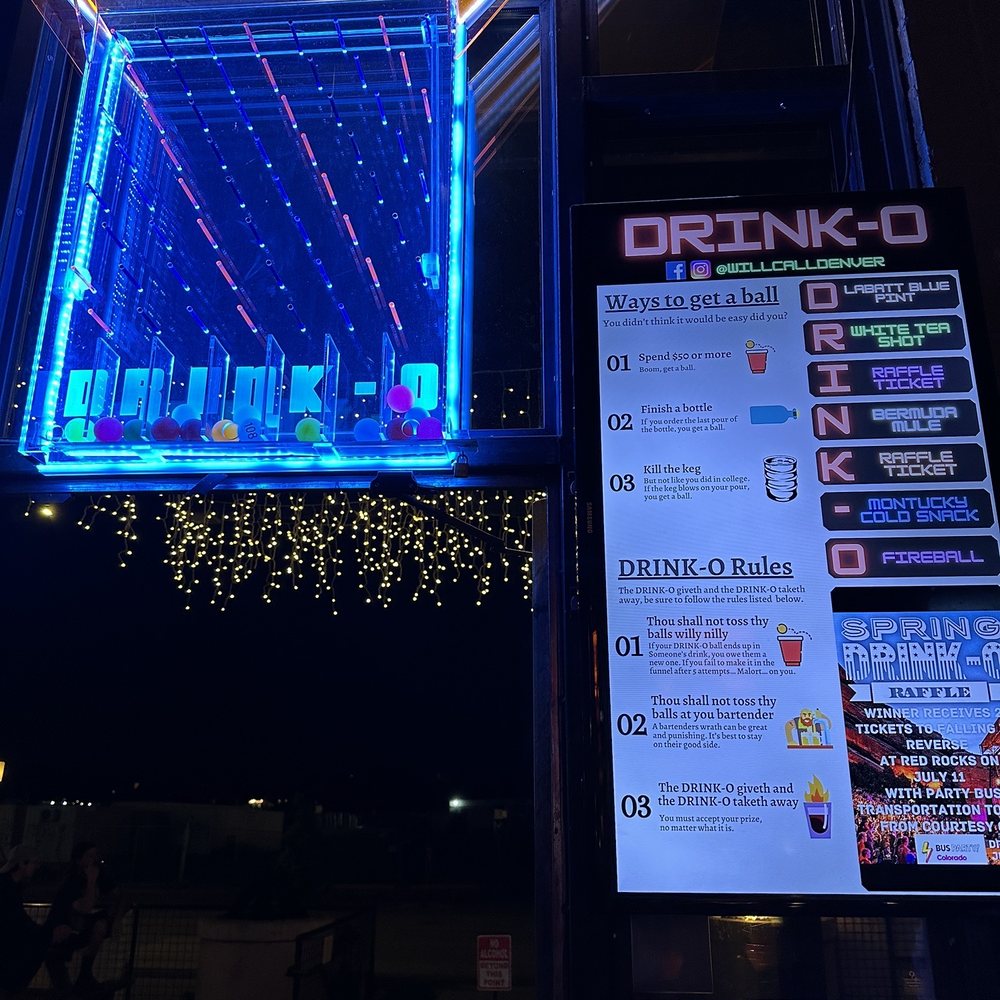 a neon sign for a bar a neon sign for a bar