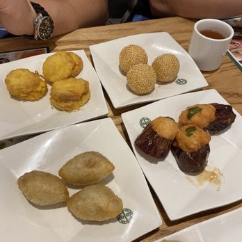 Tim Ho Wan - Hell's Kitchen - French Toast Filled with Custard Lava Custard Sesame Ball Deep Fried Dumplings filled with Pork and Dried Shrimp Deep Fried Eggplant - Dim Sum Near Me - New York, New York Tim Ho Wan - Hell's Kitchen - French Toast Filled with Custard Lava Custard Sesame Ball Deep Fried Dumplings filled with Pork and Dried Shrimp Deep Fried Eggplant - Dim Sum Near Me - New York, New York