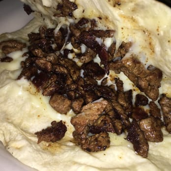 Mi Veracruz Restaurant - Inside of the steak quesadilla this cheese is AMAZING mmm steak seasoned well too - Mexican Near Me - Jacksonville, Florida