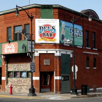 Del's Bar - a red brick building on a corner - Dive Bars Near Me - La Crosse, Wisconsin