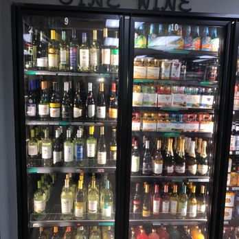First Stop Food Store - a display of bottles of wine - Convenience Stores Near Me - Houston, Texas First Stop Food Store - a display of bottles of wine - Convenience Stores Near Me - Houston, Texas