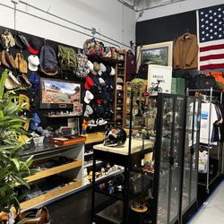 The Garage Sale Warehouse - About Time booth. Vintage watches knives hats clothing sporting goods etc