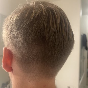 Supercuts - pictured is the chunk of uneven hair and the side that's left with no hair to fix - Hair Salons Near Me - Gilbert, Arizona