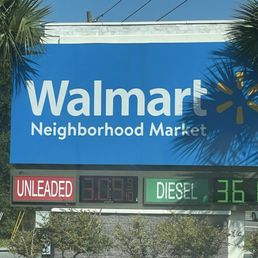 Exterior outside entrance of Walmart Fuel Station - Signage at the front of the entrance. - Apopka, Florida Exterior outside entrance of Walmart Fuel Station - Signage at the front of the entrance. - Apopka, Florida