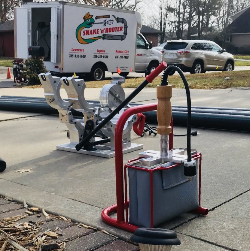 Slide of Snake 'n' Rooter Plumbing Company