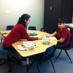 Treehouse Pediatric Therapy - Our OT working on fine motor activities with a child.