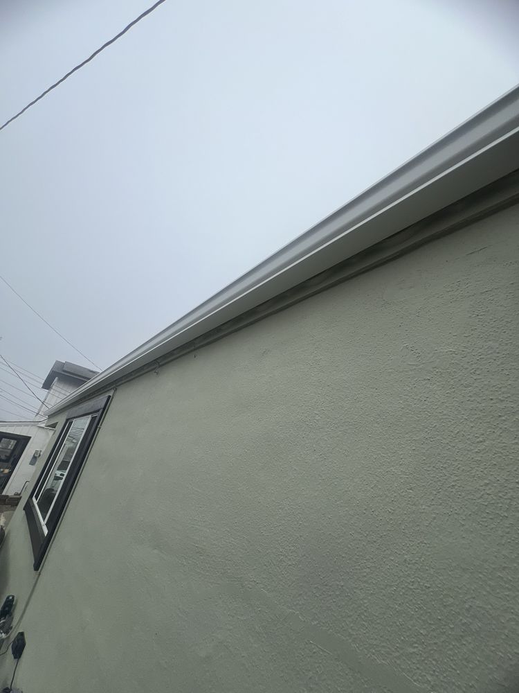 Slide of Oscar's Gutters & Downspouts