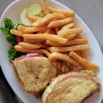 Sunflower Cafe - Monte Cristo- really good! Has to eat with a fork and knife since it was a little wet but great dipped in syrup! - Cafes Near Me - Fort Myers Beach, Florida Sunflower Cafe - Monte Cristo- really good! Has to eat with a fork and knife since it was a little wet but great dipped in syrup! - Cafes Near Me - Fort Myers Beach, Florida