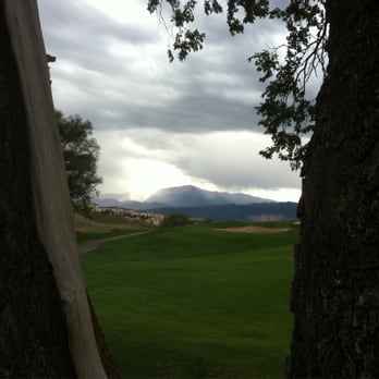Pine Creek Golf Course - Looking towards Pikes Peak through the Oak on 18 - Golf Near Me - Colorado Springs, Colorado Pine Creek Golf Course - Looking towards Pikes Peak through the Oak on 18 - Golf Near Me - Colorado Springs, Colorado
