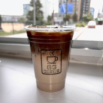GG Brews - Iced "Dirty Chai" Latte (chai tea + floated espresso) - Coffee & Tea Near Me - Denver, Colorado GG Brews - Iced "Dirty Chai" Latte (chai tea + floated espresso) - Coffee & Tea Near Me - Denver, Colorado