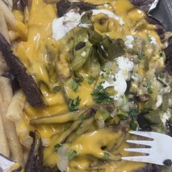 Taqueria El Molcajete - Carne asada fries with roasted jalapeños and queso