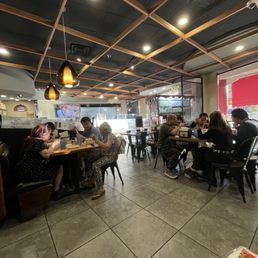front door remained open, so the restaurant felt warmer than expected.