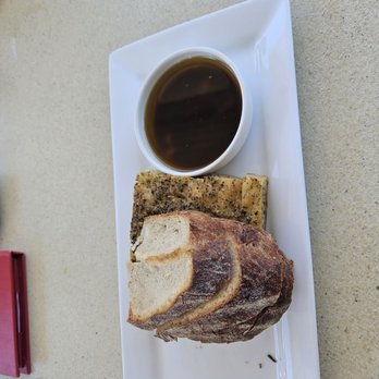 Parrish Family Vineyard - Homemade bread and olive oil plate - Wine Tasting Room Near Me - Paso Robles, California Parrish Family Vineyard - Homemade bread and olive oil plate - Wine Tasting Room Near Me - Paso Robles, California