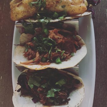 Blanco Cantina - Top - fish taco, middle- pulled pork, bottom- beef brisket. - Bars Near Me - Calgary, Alberta Blanco Cantina - Top - fish taco, middle- pulled pork, bottom- beef brisket. - Bars Near Me - Calgary, Alberta