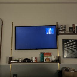 The TV was hanging off center, crooked, and buffering in between channels. Also FYI it also only has a handful of channels.