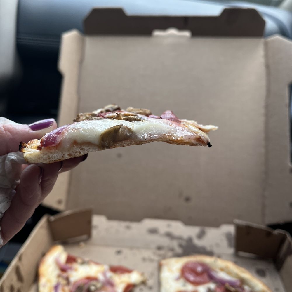 Moonlight Pizza & Brewpub - Sturdiness of the perfectly cooked thin crust pizza - Pizza Near Me - Salida, Colorado Moonlight Pizza & Brewpub - Sturdiness of the perfectly cooked thin crust pizza - Pizza Near Me - Salida, Colorado