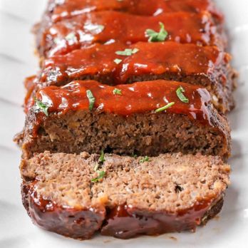 Uptown Cafe - sliced meatloaf on a white plate - New American Near Me - Butte, Montana Uptown Cafe - sliced meatloaf on a white plate - New American Near Me - Butte, Montana