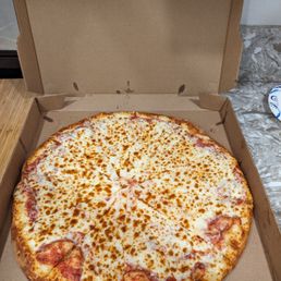 XL Pizza with Extra Cheese. The mozzarella they use is so buttery tasting and the cheese pulls when you bite. XL Pizza with Extra Cheese. The mozzarella they use is so buttery tasting and the cheese pulls when you bite.