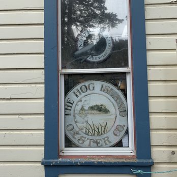 Hog Island Oyster - Their logo, hiding behind the window (by the road side) - Seafood Near Me - Marshall, California Hog Island Oyster - Their logo, hiding behind the window (by the road side) - Seafood Near Me - Marshall, California