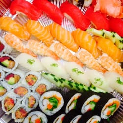 Shin-La Restaurant & Sushi Bar - Sushi Special:  3 rolls and 22 pieces of sushi selected by the chef (comes with miso soup and salad when dining in)