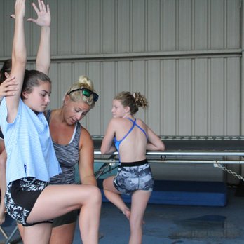 High 5 - Colwill Dive Team - Dry Land Trampoline Practice with Coach Nicole Russell. - Child Care & Day Care Near Me - Brandon, Florida