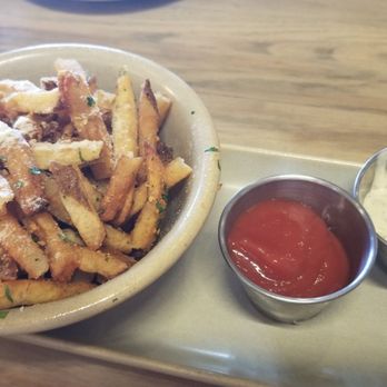 Monkeypod Kitchen - Garlic truffle oil fries. Just wish the fries were longer but super tasty. - New American Near Me - Lahaina, Hawaii