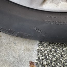 Tires clearly have gashes and they are recommending a tire rotation