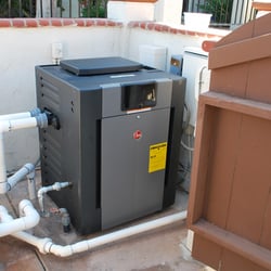 Protouch Pool Services - Installing a new Raypak pool heater for a customer in San Diego. His old Hayward pool heater failed and he wanted to use the hot tub.