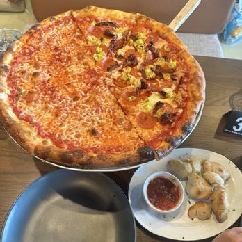 Ritrovo - Half Cheese Half Pepp, Banana Peppers, and Sun dried tomatoes - Pizza Near Me - Asheville, North Carolina Ritrovo - Half Cheese Half Pepp, Banana Peppers, and Sun dried tomatoes - Pizza Near Me - Asheville, North Carolina