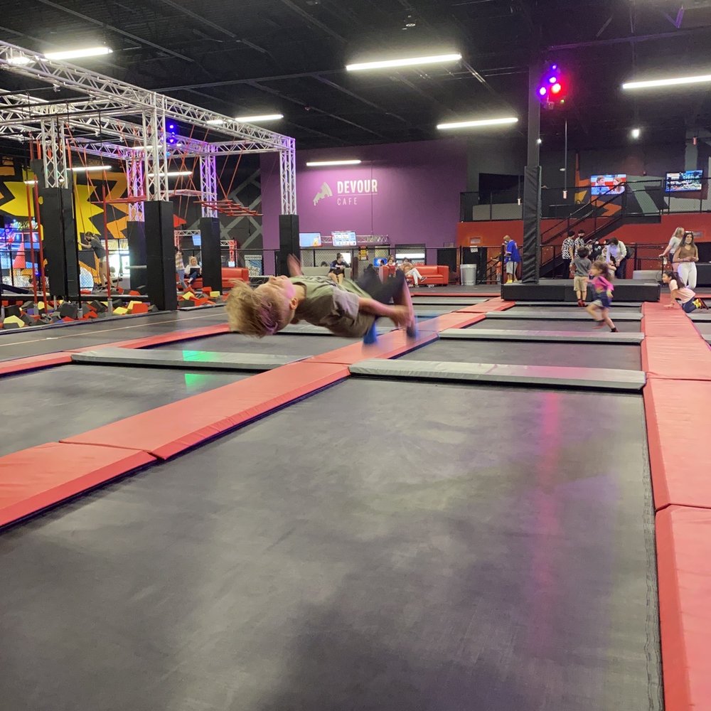 Defy - Palm Springs - Obstacle course areas are over to the left as well as some slides - Trampoline Parks Near Me - Palm Springs, Florida