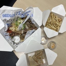 Souvlaki plate (not with chicken as ordered), fries, and extra pita Souvlaki plate (not with chicken as ordered), fries, and extra pita