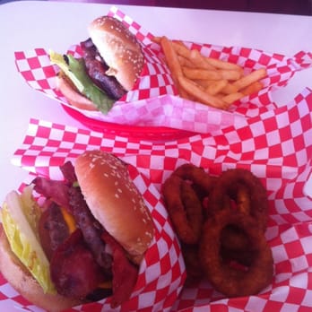 Mark's Burgers - Bottom: Jack Daniels burger with onion rings Top: Champion burger with french fries - Burgers Near Me - Tijuana, BCN