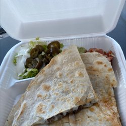 Chevron - Carne asada supreme quesadilla.