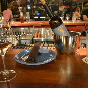 Extra Virgin - Overall setting with the wine - Tapas/Small Plates Near Me - Kansas City, Missouri Extra Virgin - Overall setting with the wine - Tapas/Small Plates Near Me - Kansas City, Missouri