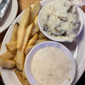 Texas Roadhouse - French fries, mashed potatoes with country gravy - Steakhouses Near Me - Tampa, Florida Texas Roadhouse - French fries, mashed potatoes with country gravy - Steakhouses Near Me - Tampa, Florida