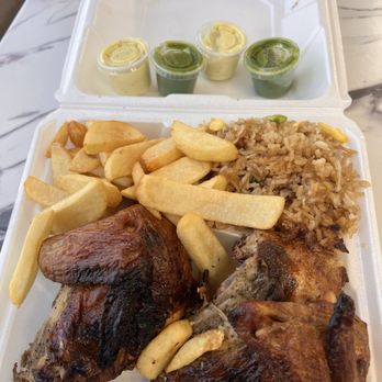 Tu Chicken - 1/2 Chicken (white) fried rice and French Fries. Don't forget the white and green sauce. The green has a really nice kick to it! - Peruvian Near Me - Herndon, Virginia Tu Chicken - 1/2 Chicken (white) fried rice and French Fries. Don't forget the white and green sauce. The green has a really nice kick to it! - Peruvian Near Me - Herndon, Virginia