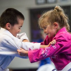 Industrial Strength: Fitness & Jiu Jitsu - Two kids doing Jiu Jitsu