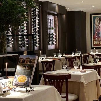 Masseria East - tables and chairs with white tablecloths - Italian Near Me - New York, New York Masseria East - tables and chairs with white tablecloths - Italian Near Me - New York, New York