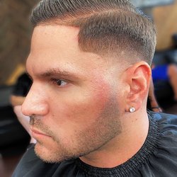 Dapper Don Barber Lounge - Cabs here, are you dapper ready? Low taper fade with trim & texture by Stuss the barber