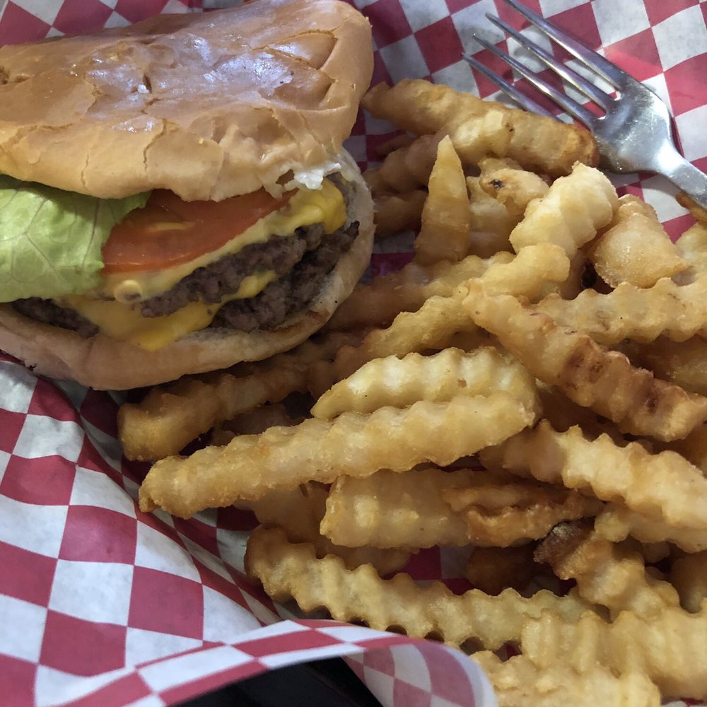"Pender Burger" with side of fries. "Pender Burger" with side of fries.