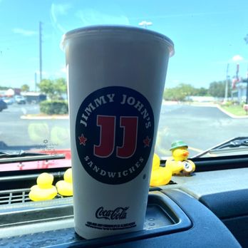 Jimmy John's - a cup of coffee on the dashboard of a car - Sandwiches Near Me - Tavares, Florida Jimmy John's - a cup of coffee on the dashboard of a car - Sandwiches Near Me - Tavares, Florida
