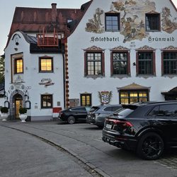 Schlosshotel Grünwald - Up close of the traditional authentic exterior. There is an outdoor patio for dining too