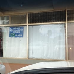 Arthritis Laser Pain Center Of Hawaii - His sign is in the window
